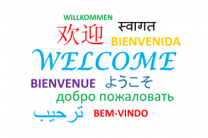 Hier ist der Schriftzug "Willkommen" in verschiedenen landessprachen zu sehen.